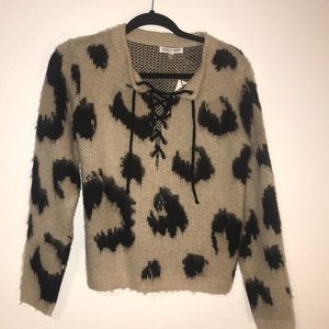 Animal print lace up sweater